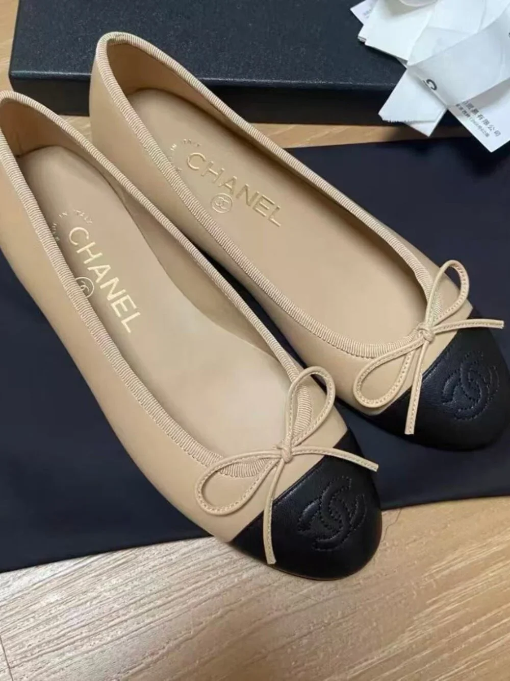 Chanel Beige Black Cap‑Toe CC Bow Leather Ballet Flats